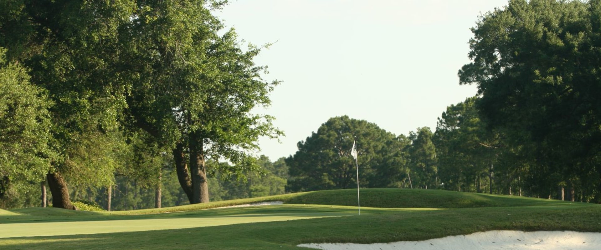 What is the dress code for golf courses in baldwin county?
